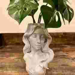 Serene woman planter