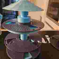 Bird feeder with empty filament spools