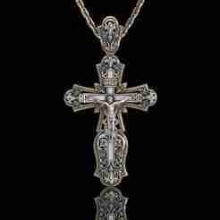 A CROSS WITH A CRUCIFIX AND AN ORNAMENT 3D print model