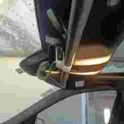 Eyeglass holder for sun visor