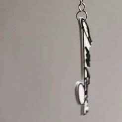 Keychain and Pin with the signature of Juan Manuel Fangio F1 racer