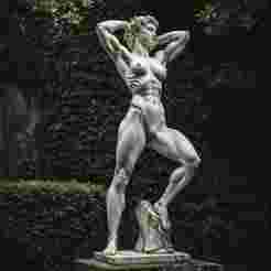 Classical Strength in Stone: Subtle Veins and Contours Enhance the Realistic Craftsmanship of This Muscular Figure on a Rough Pedestal