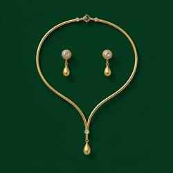 Elegance in Gold Diamond Necklace and Earrings Set