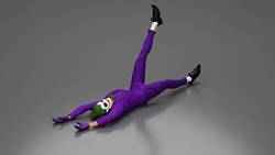 Joker sprawled laughing despite defeat plotting wicked trick