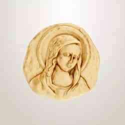 Vintage religious bas-relief in a bust of the Virgin Mary