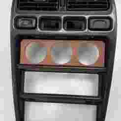 Nissan Primera 1 DIN radio cover for 52mm gauges