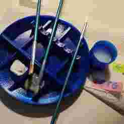 Palette + brush holder + glass.