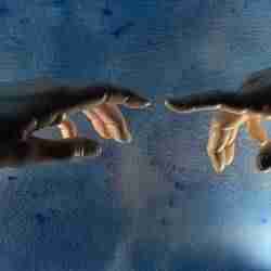 the hands in Michelangelo's painting "The Creation of Adam
